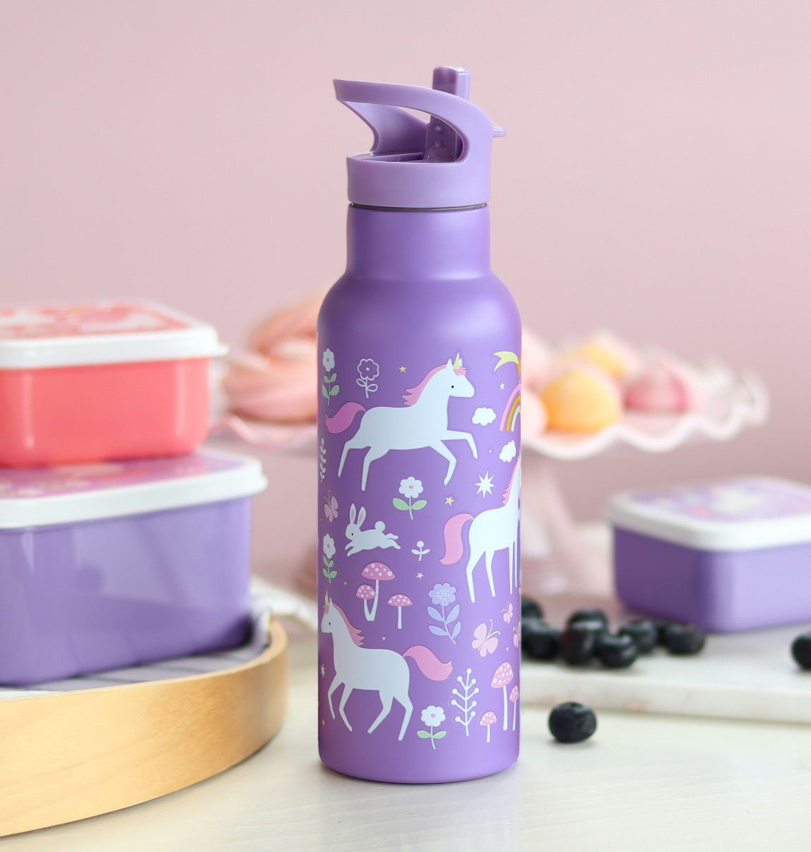 paarse drinkfles met eenhoorns en broodbakjes